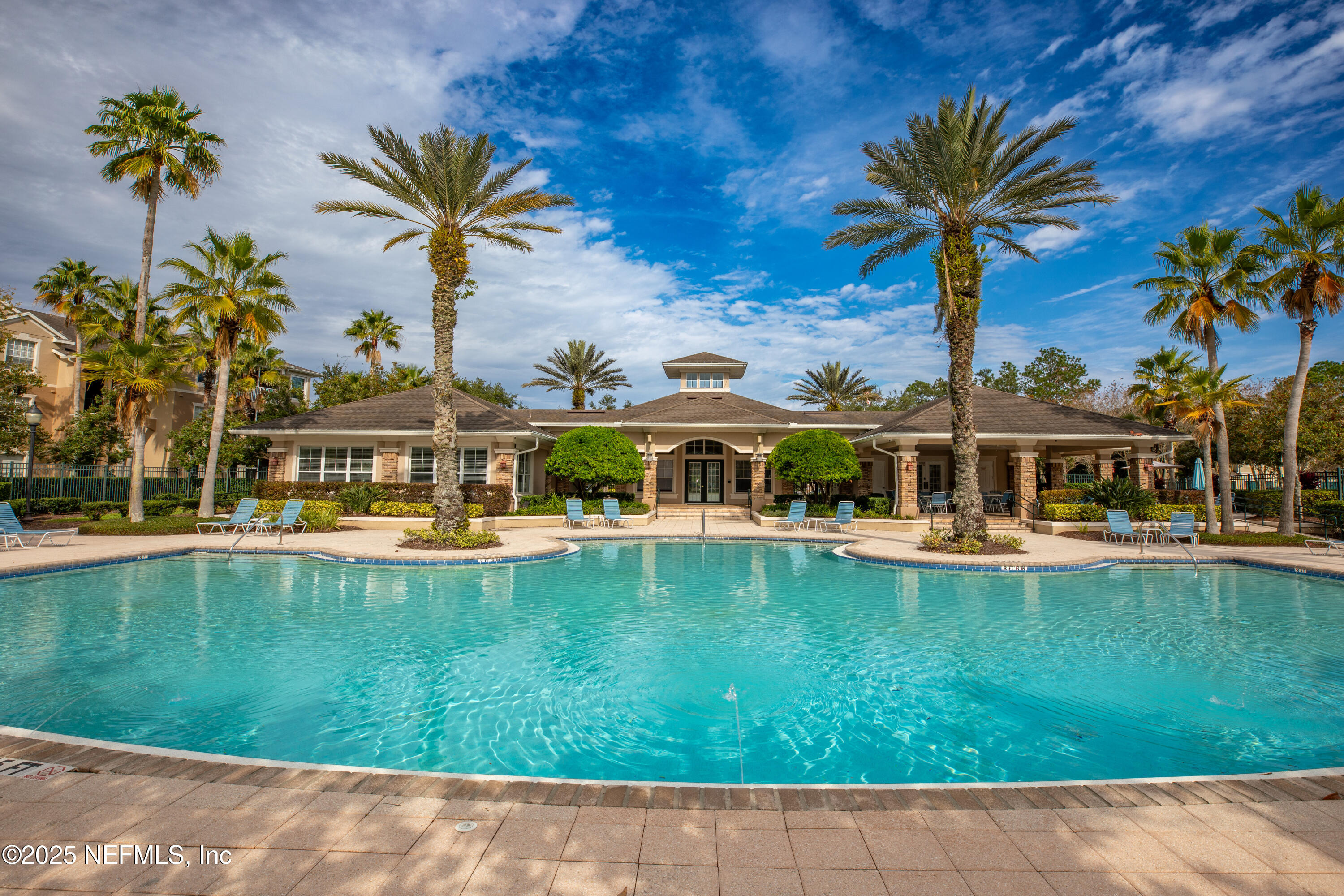 7990 Baymeadows Road, Unit 625 Jacksonville, FL 32256 - Photo 22 of 25 a front view of a house with swimming pool having outdoor seating