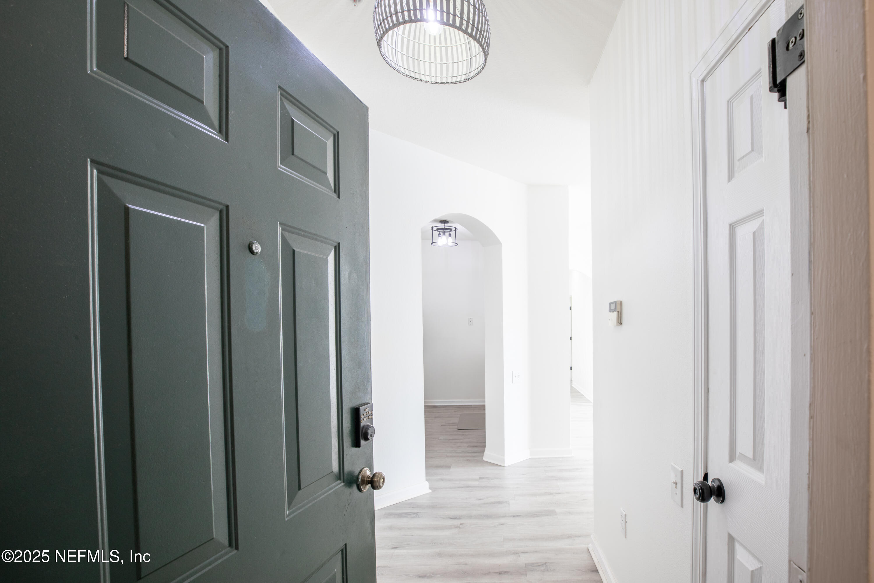 7990 Baymeadows Road, Unit 625 Jacksonville, FL 32256 - Photo 3 of 25 a view of a bathroom from a hallway