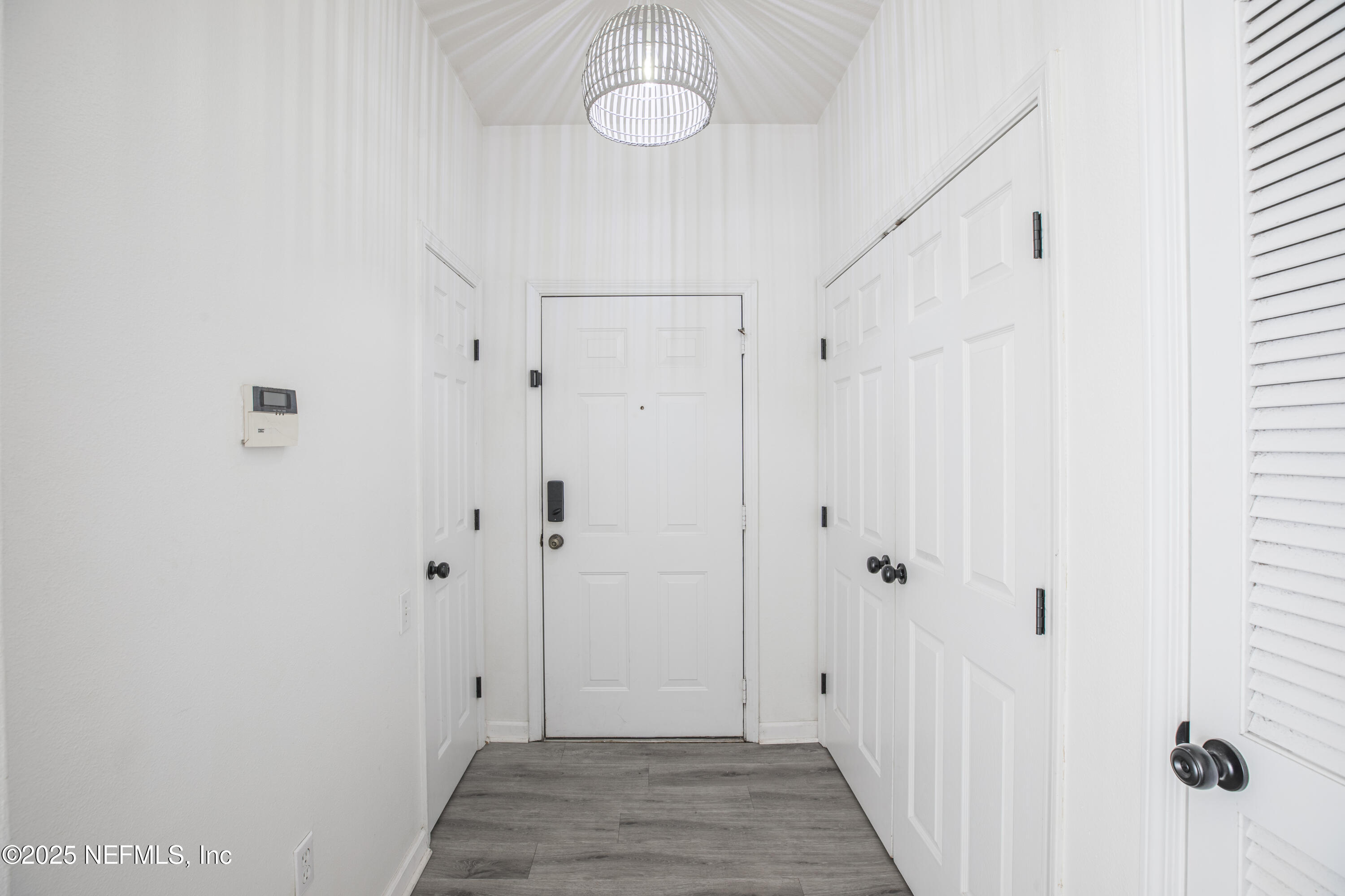 7990 Baymeadows Road, Unit 625 Jacksonville, FL 32256 - Photo 4 of 25 a view of a bathroom with a sink and a mirror