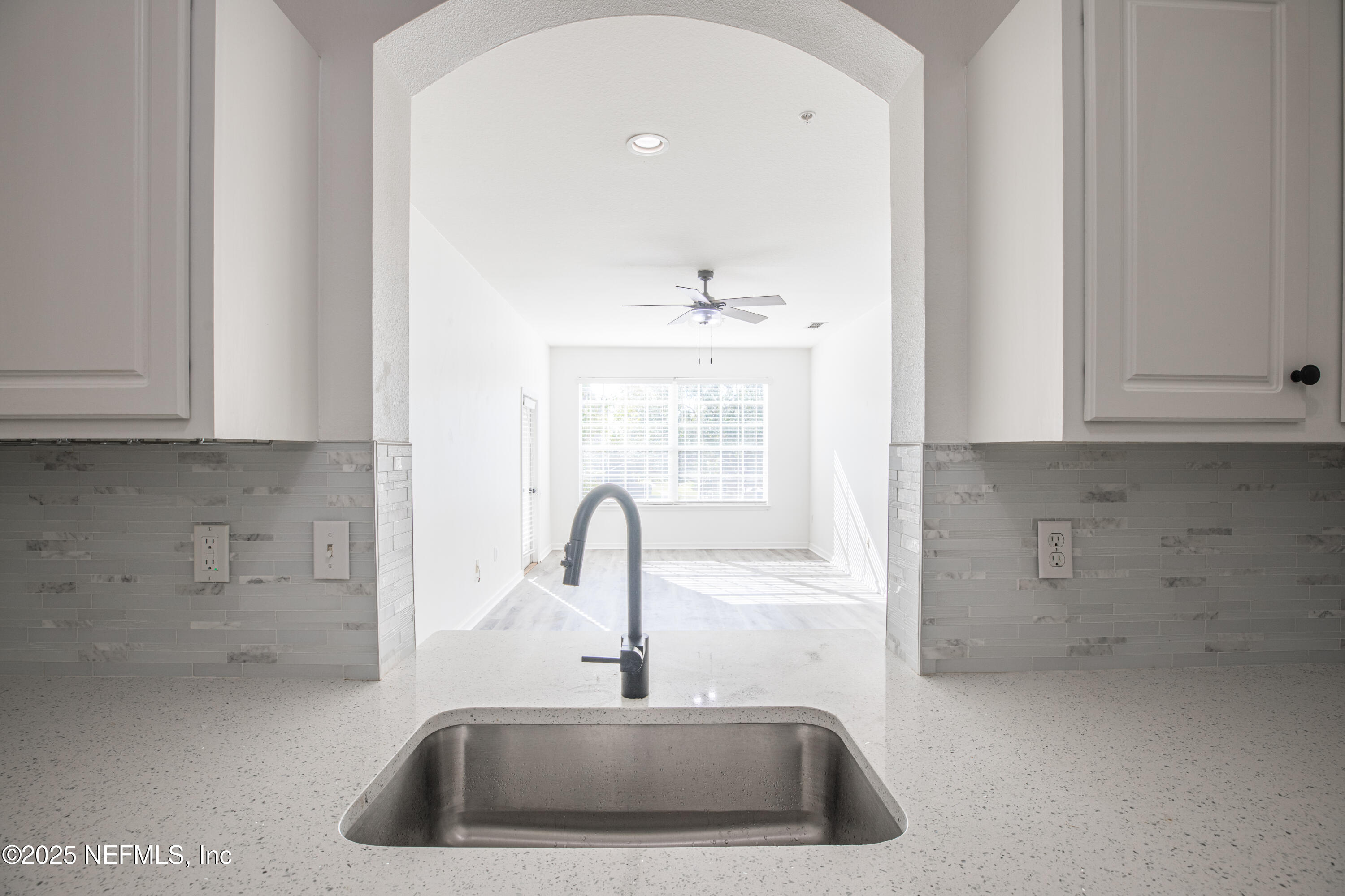 7990 Baymeadows Road, Unit 625 Jacksonville, FL 32256 - Photo 8 of 25 a kitchen with a sink and cabinets
