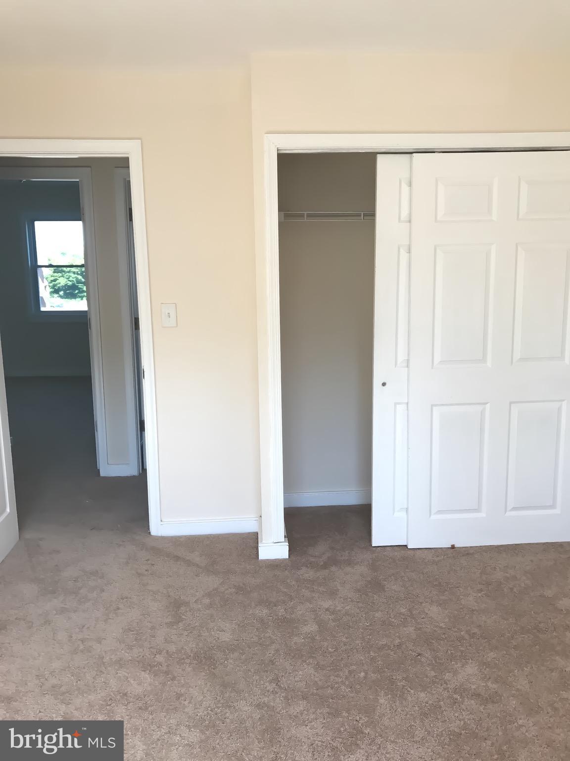 1713 Stokesley Road Baltimore, MD 21222 - Photo 14 of 15 an empty room with windows