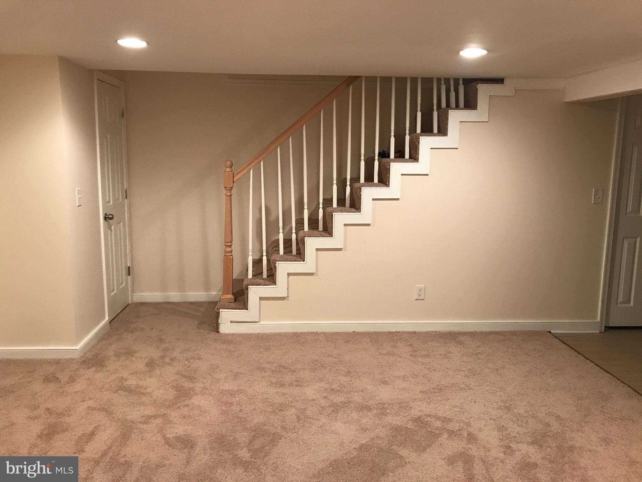 1713 Stokesley Road Baltimore, MD 21222 - Photo 6 of 15 a view of an entryway with stairs