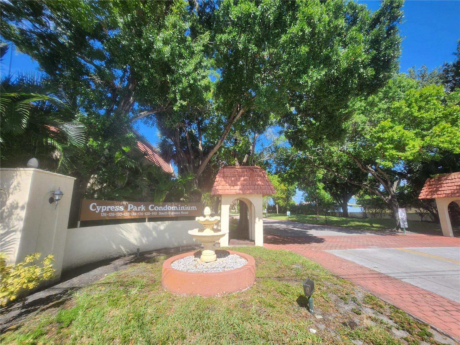 138 South Cypress Road, Unit 217 Pompano Beach, FL 33060 - Photo 21 of 21 a outdoor view with a sitting space