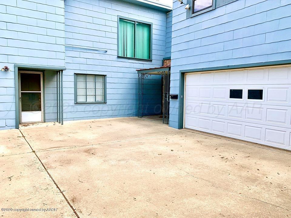 3701 South Van Buren Street Amarillo, TX 79110 - Photo 15 of 27 a view of yellow house with a outdoor space