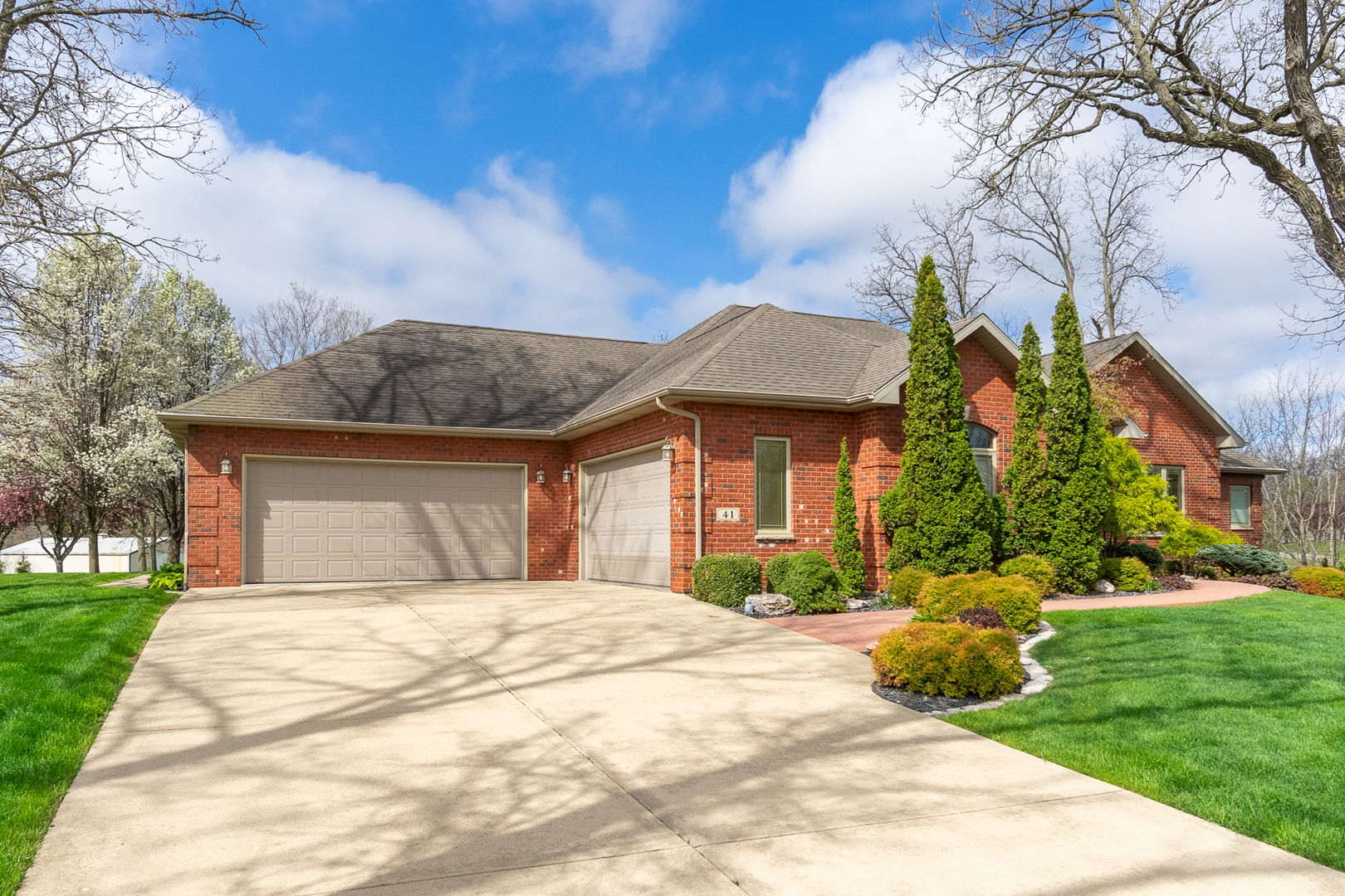 41 Oak Ridge Drive LaSalle, IL 61301 - Photo 2 of 38 a front view of a house with a yard and trees