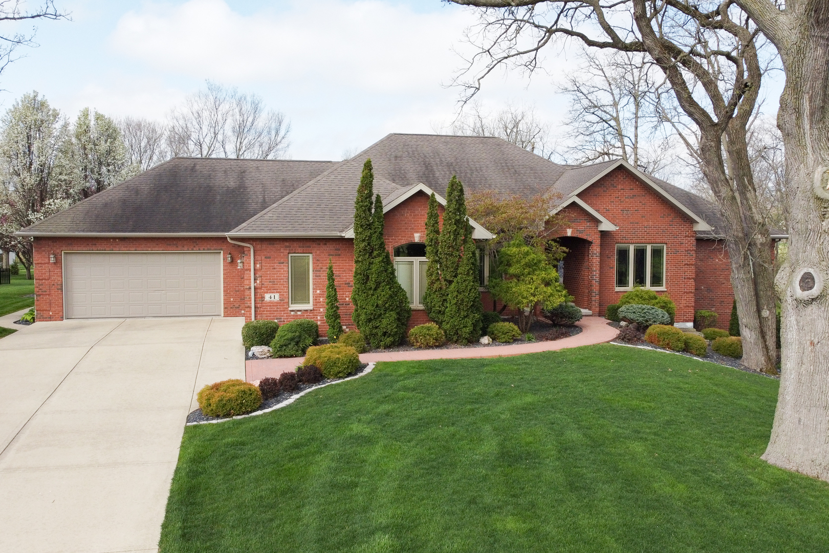 41 Oak Ridge Drive LaSalle, IL 61301 - Photo 38 of 38 a front view of a house with a yard and garage