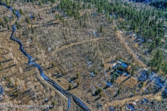 a view of a large building with mountain view