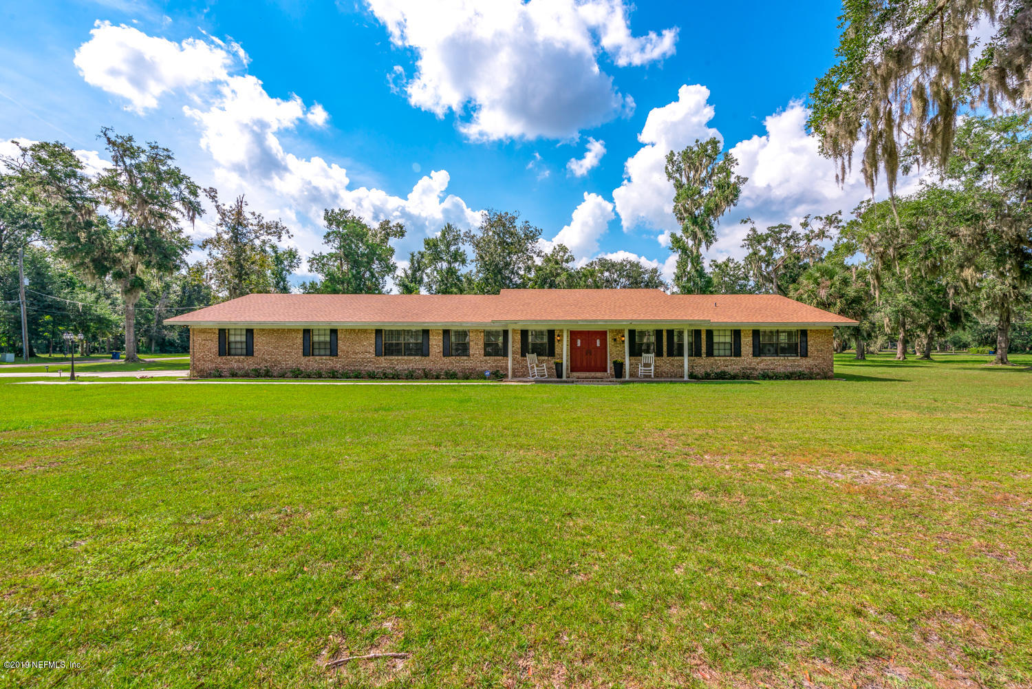 a view of a house with a garden