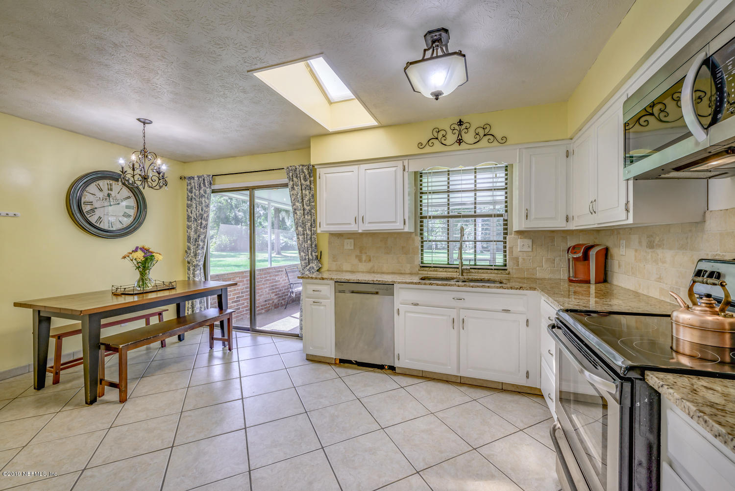 17525 Eagle Bend Boulevard Jacksonville, FL 32226 - Photo 14 of 49 a kitchen with a sink appliances cabinets and furniture
