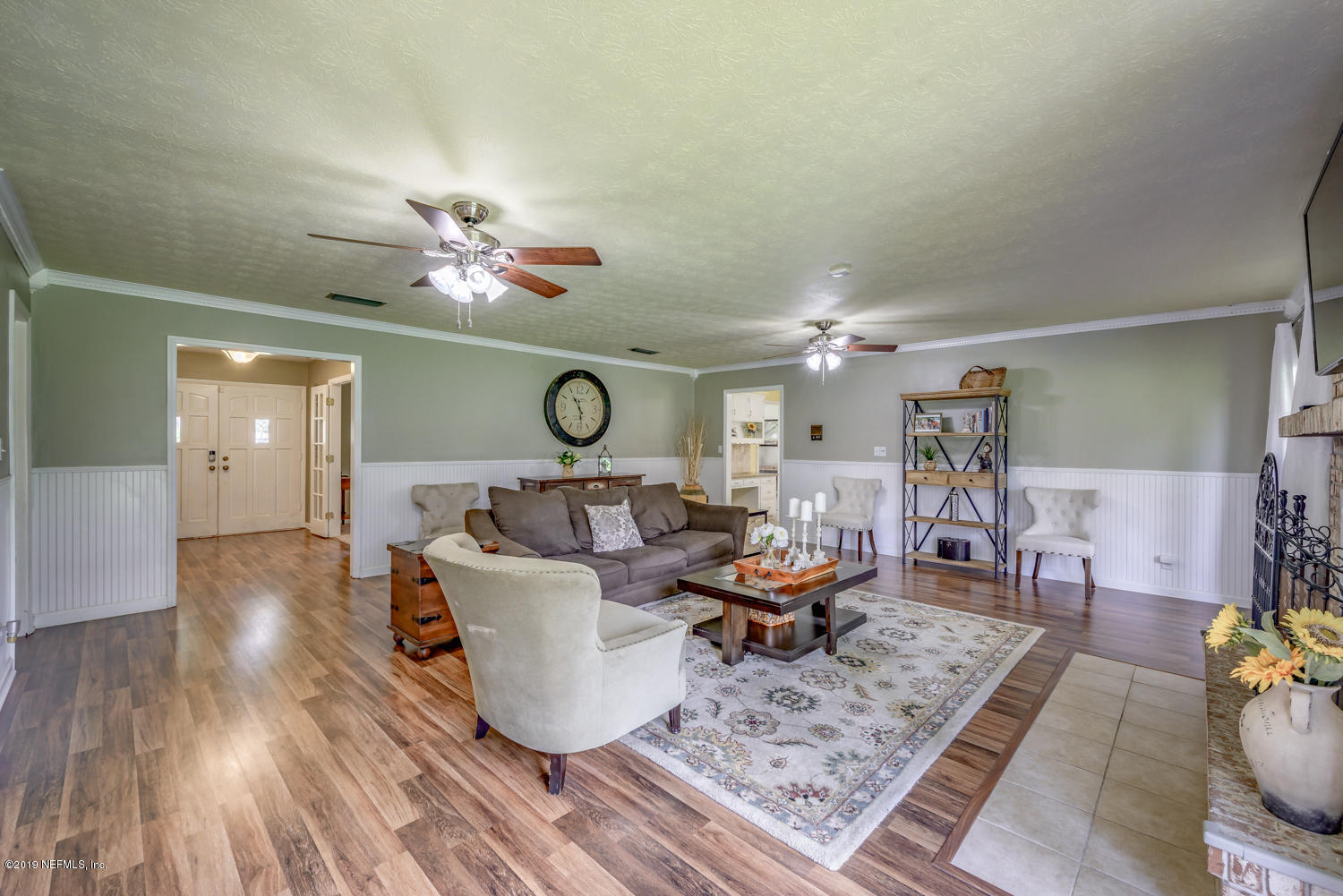 17525 Eagle Bend Boulevard Jacksonville, FL 32226 - Photo 17 of 49 a living room with furniture and wooden floor