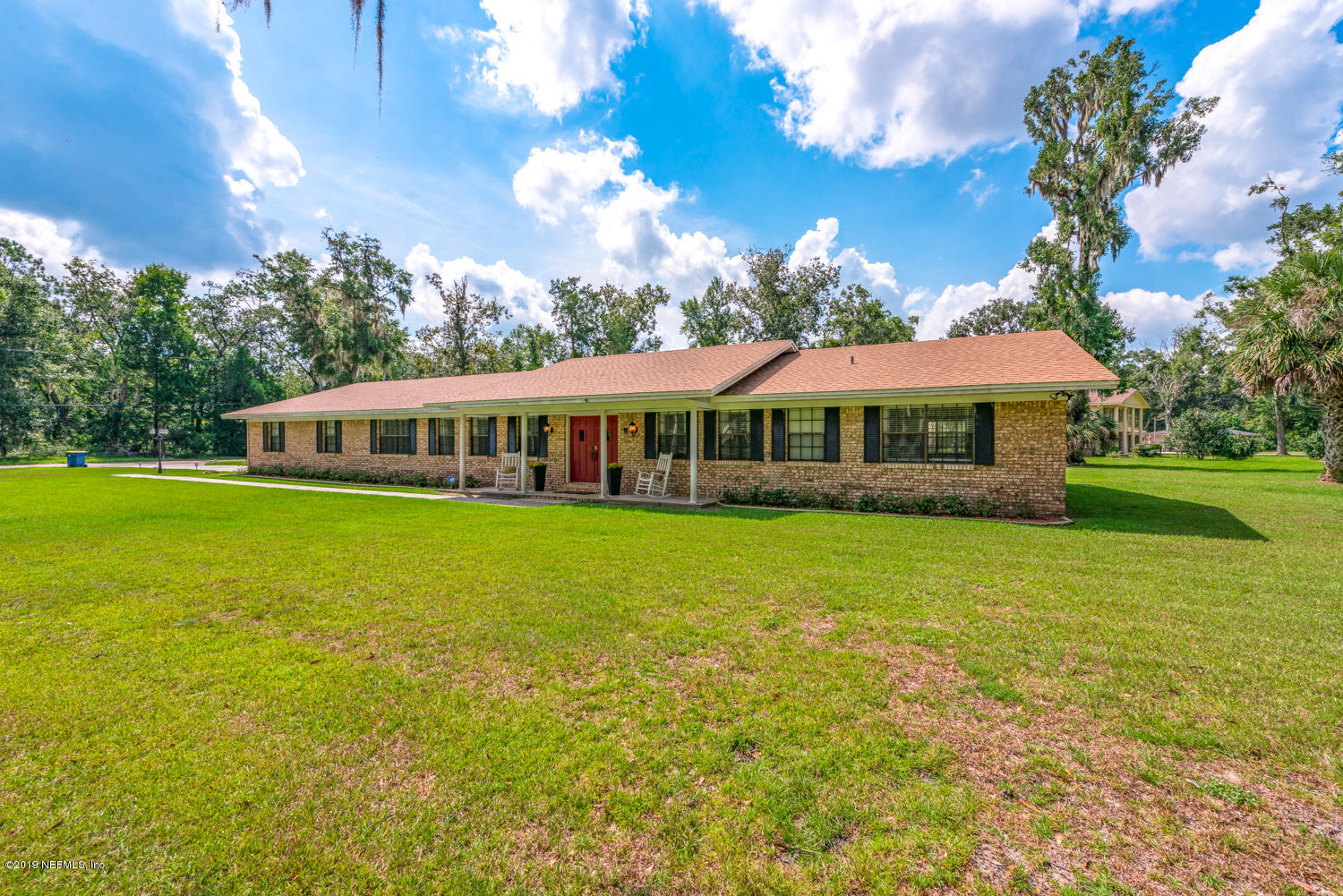 17525 Eagle Bend Boulevard Jacksonville, FL 32226 - Photo 2 of 49 a front view of house with yard and swimming pool