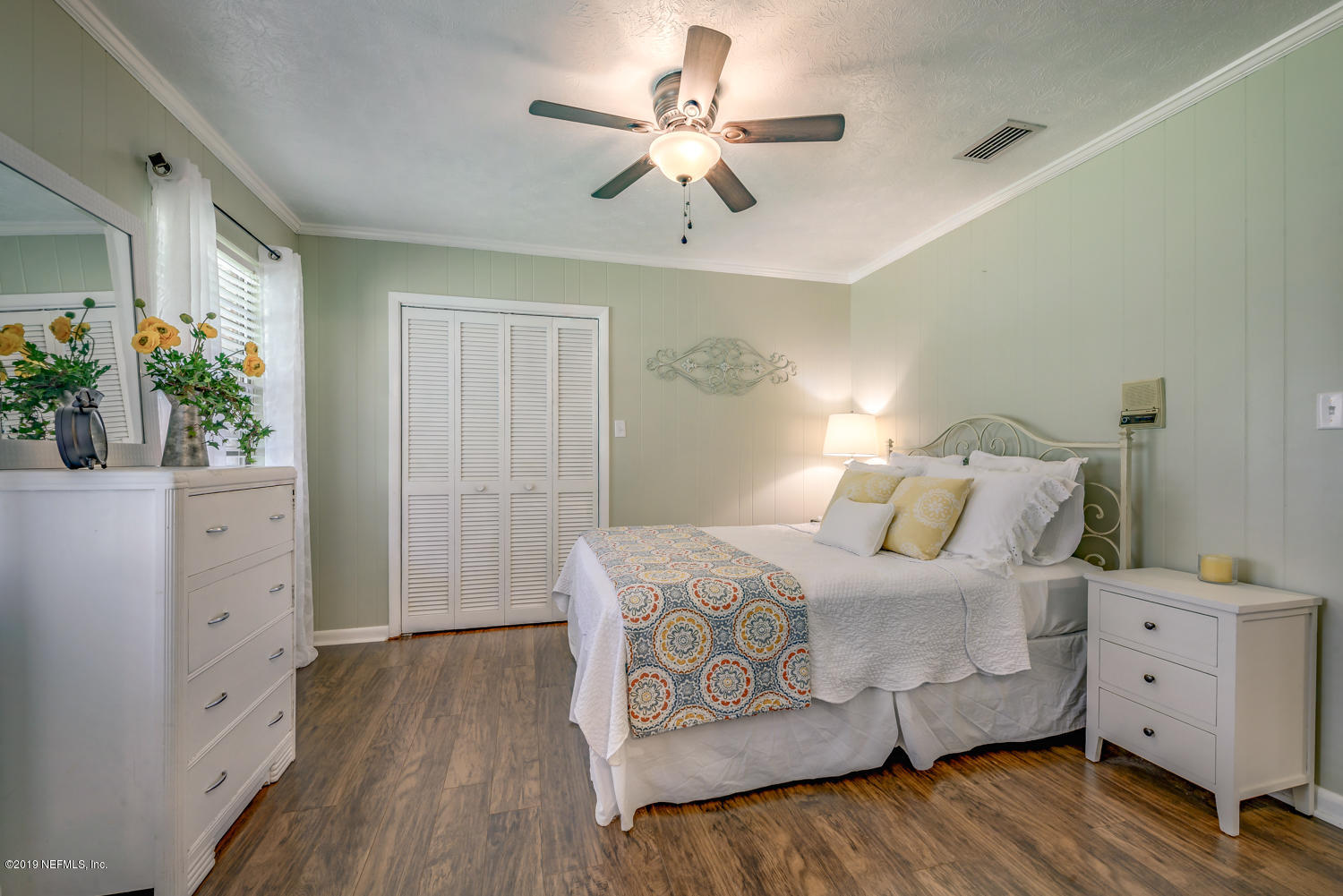 17525 Eagle Bend Boulevard Jacksonville, FL 32226 - Photo 25 of 49 a bedroom with a bed and a dresser