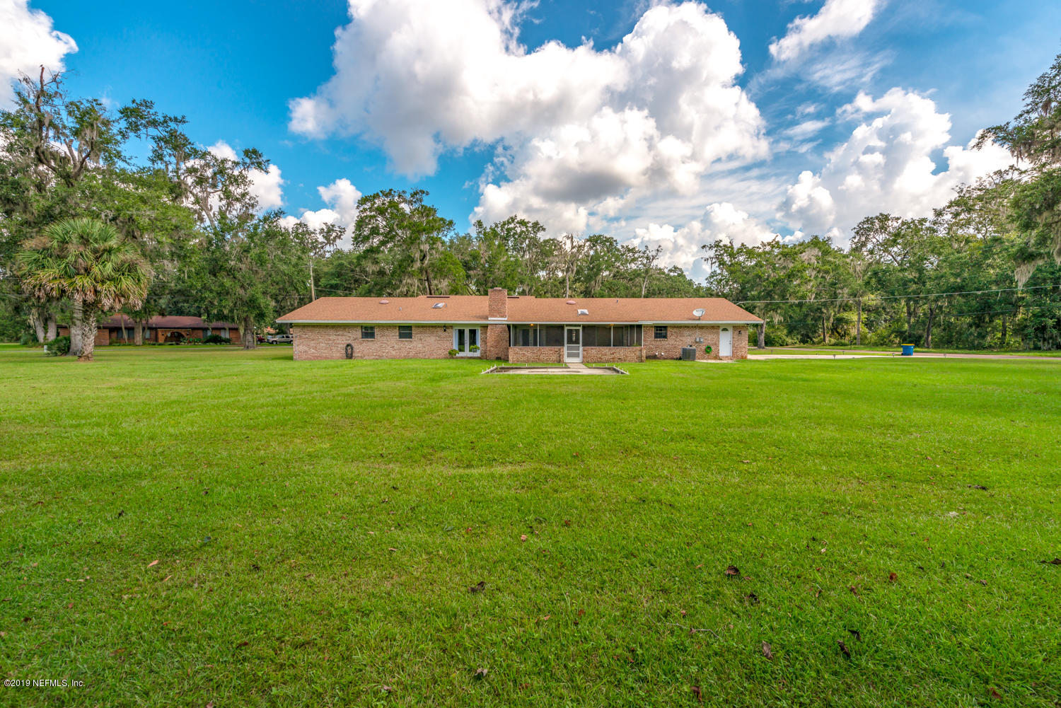 17525 Eagle Bend Boulevard Jacksonville, FL 32226 - Photo 30 of 49 a view of a house with a big yard
