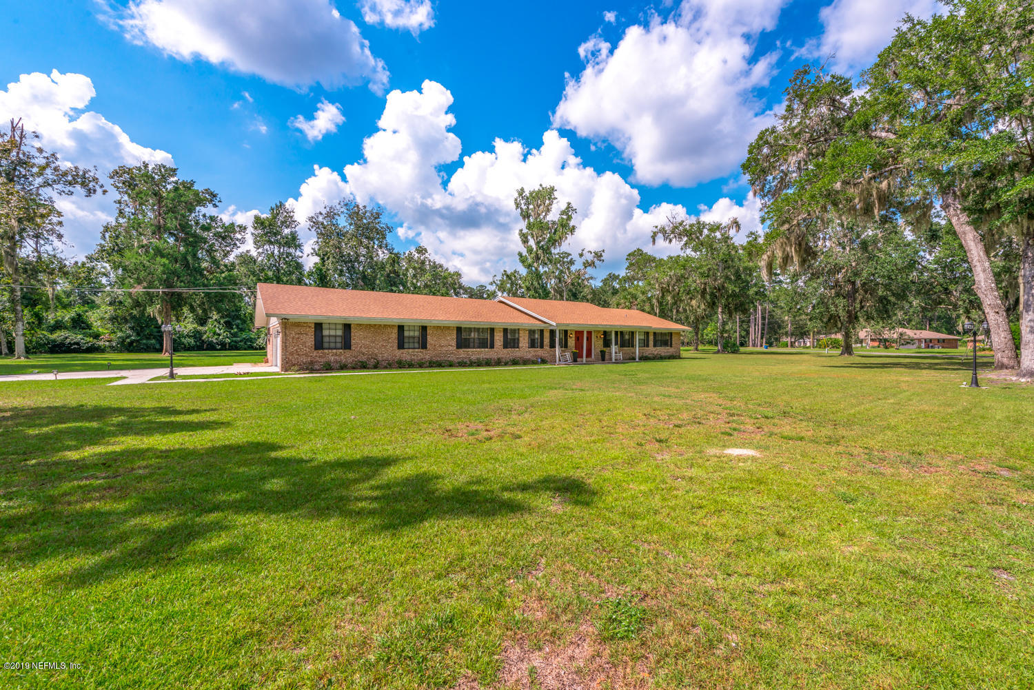 17525 Eagle Bend Boulevard Jacksonville, FL 32226 - Photo 3 of 49 a view of a house with yard and porch