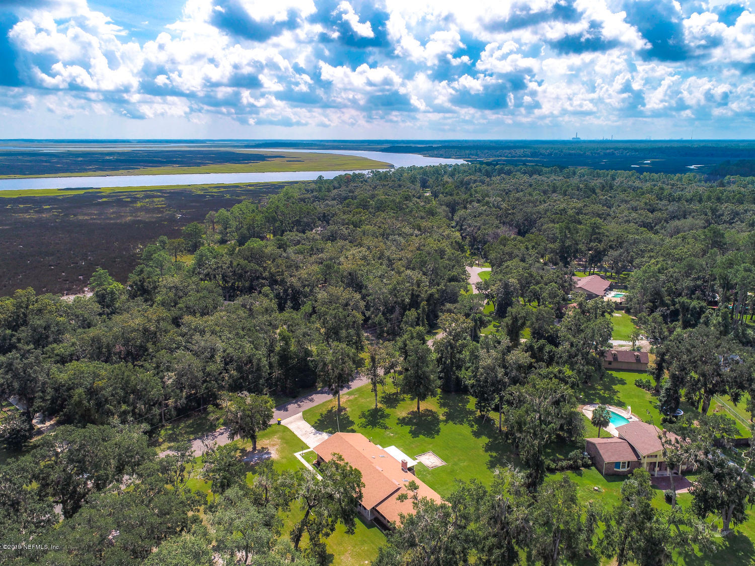 17525 Eagle Bend Boulevard Jacksonville, FL 32226 - Photo 42 of 49 a view of a lake with large trees