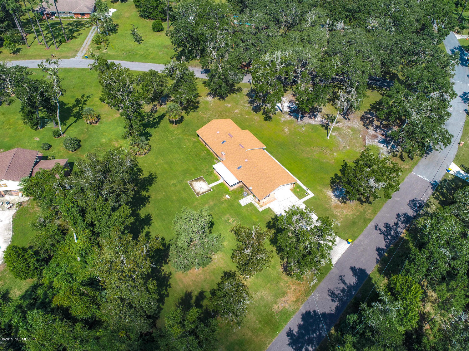 17525 Eagle Bend Boulevard Jacksonville, FL 32226 - Photo 46 of 49 an aerial view of a house with a yard and lake view