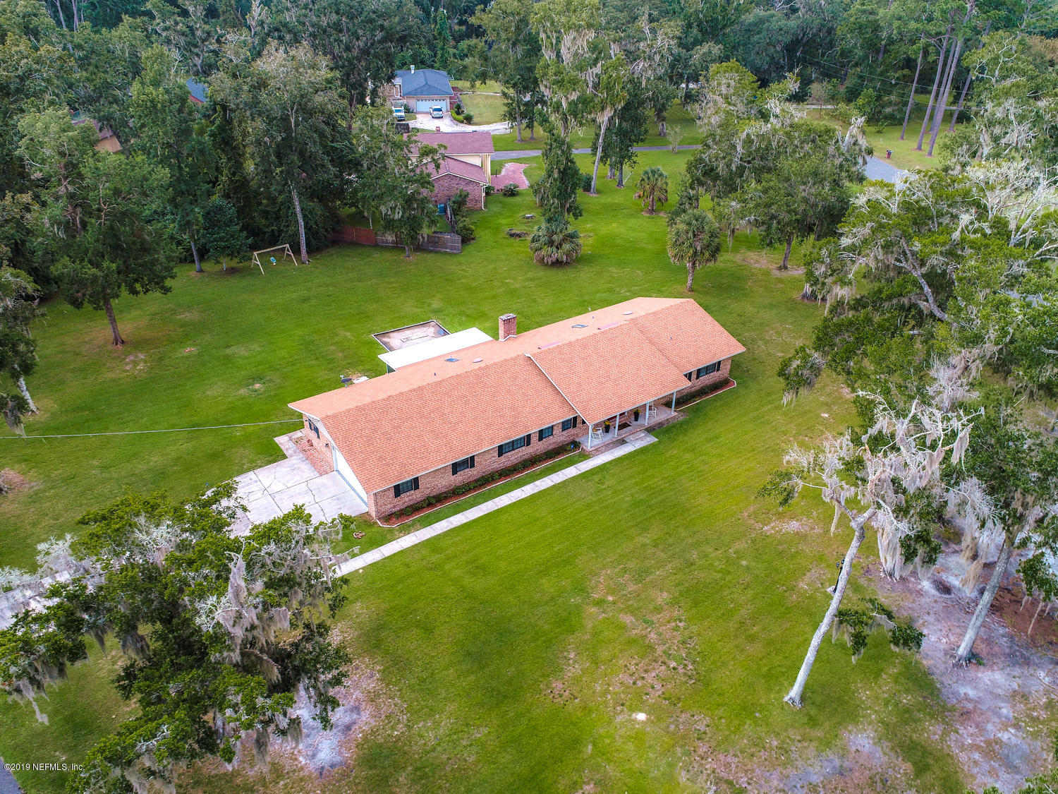 17525 Eagle Bend Boulevard Jacksonville, FL 32226 - Photo 49 of 49 an aerial view of a house with a yard basket ball court and outdoor seating