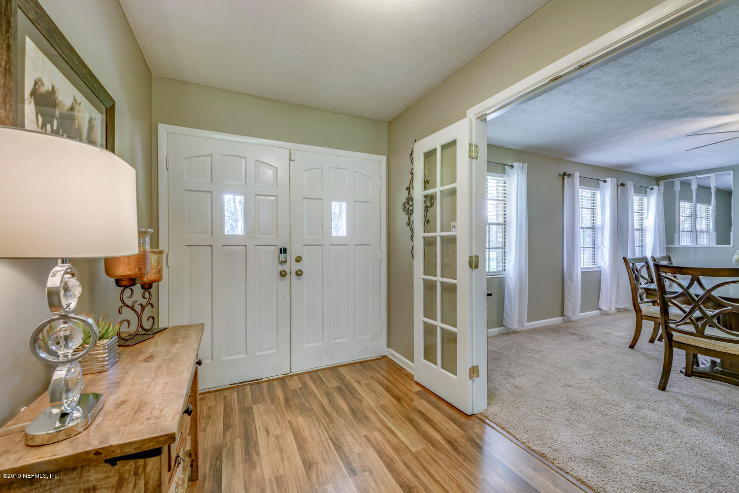 17525 Eagle Bend Boulevard Jacksonville, FL 32226 - Photo 7 of 49 a view of a room with furniture and wooden floor