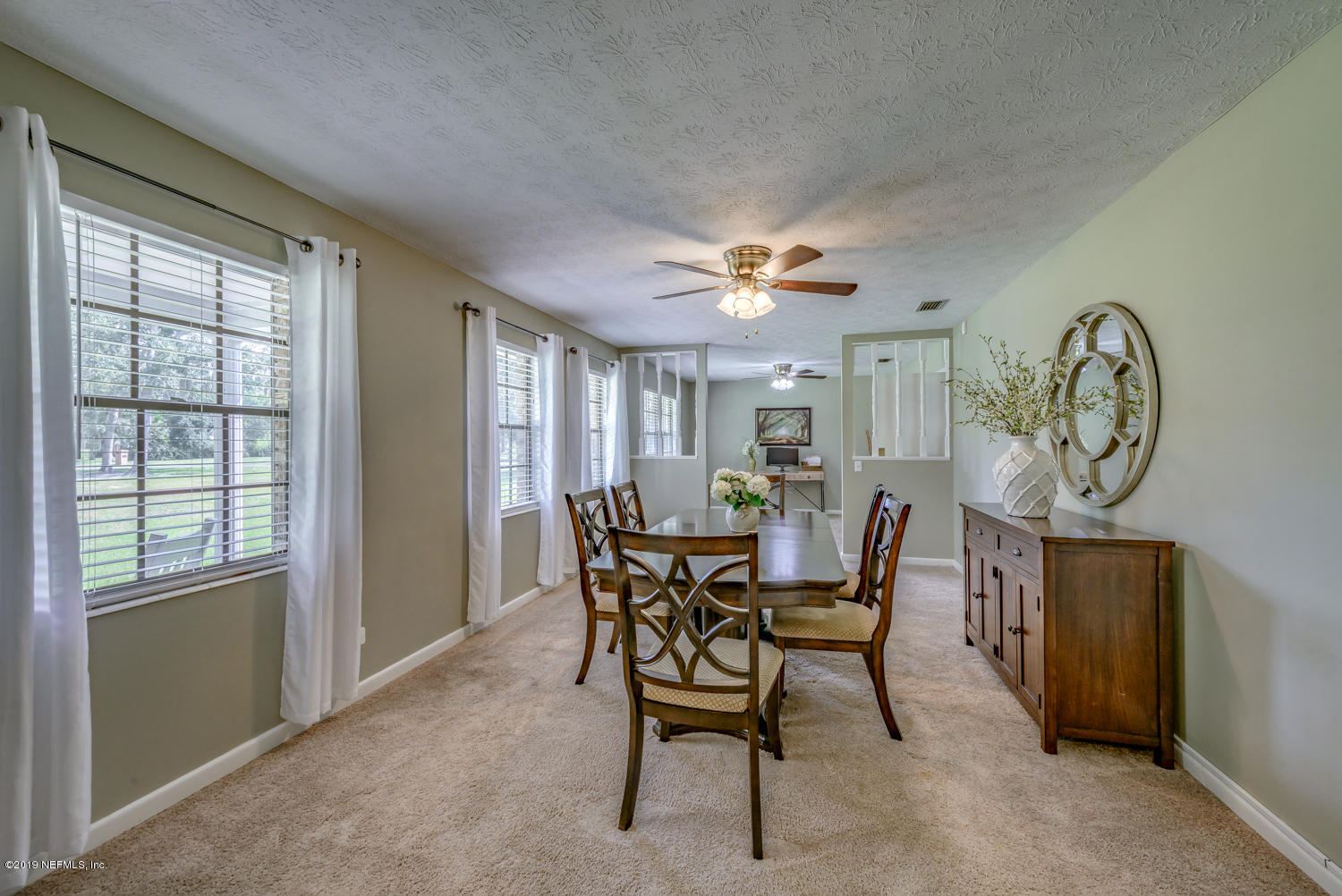17525 Eagle Bend Boulevard Jacksonville, FL 32226 - Photo 8 of 49 a view of a livingroom with furniture and a window