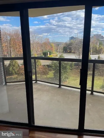 a view of a lake from a balcony