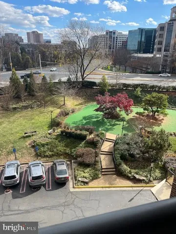 a view of a street with an outdoor space