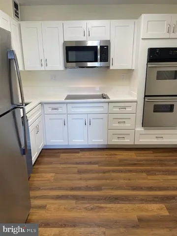 a view of small space with wooden floor