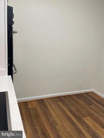 a view of a patio with table and chairs