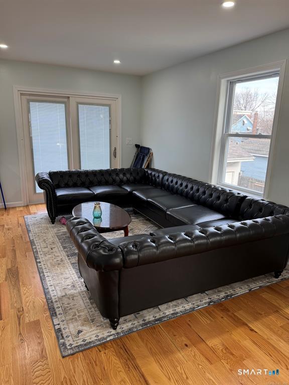 695 Shelton Street Bridgeport, CT 06608 - Photo 7 of 36 a black and white photo of a living room