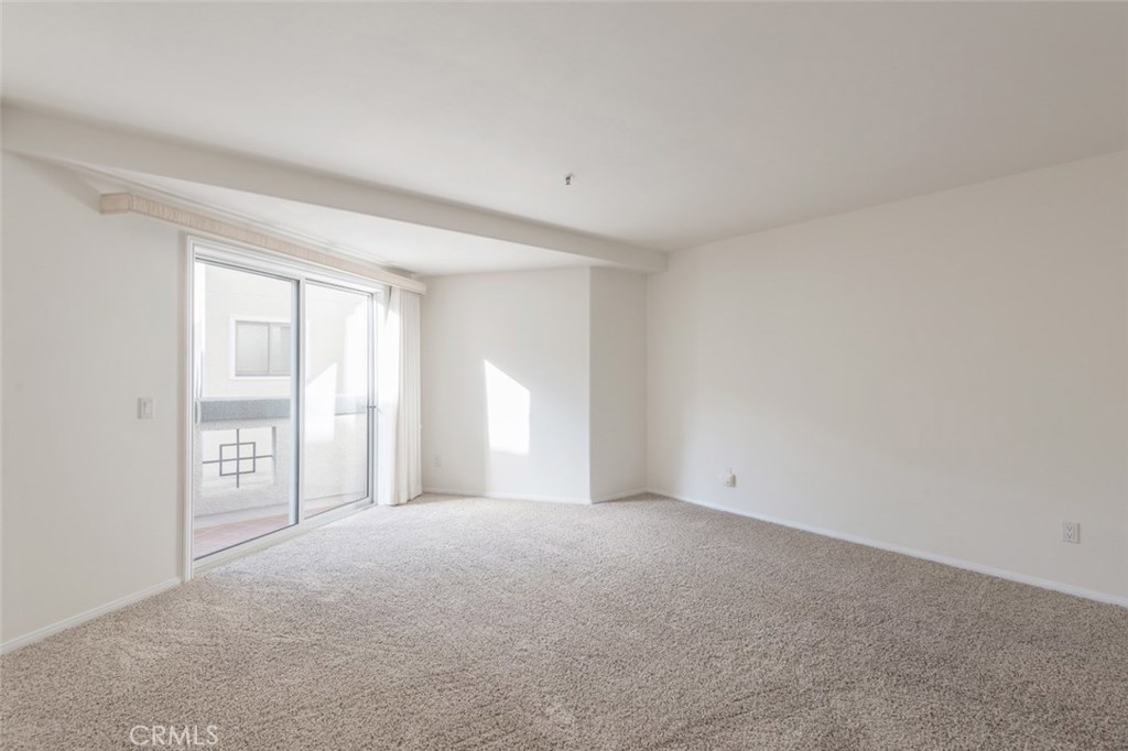 200 Pacific Coast Highway, Unit 314 Huntington Beach, CA 92648 - Photo 10 of 26 a view of an empty room with a window