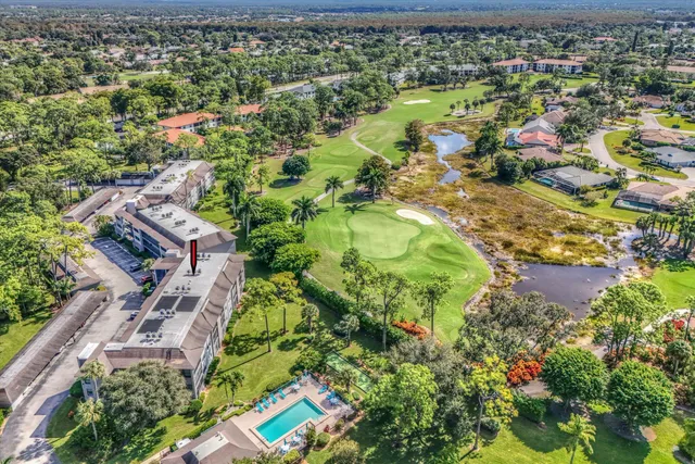 an aerial view of a house with a garden