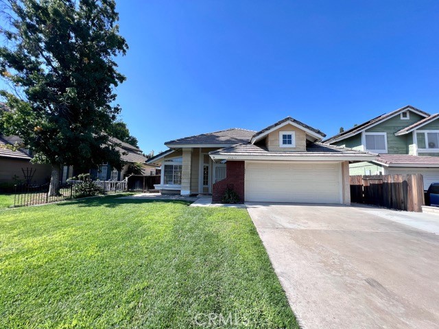 39879 Osprey Road Murrieta, CA 92562 - Photo 1 of 38 a front view of a house with a yard and garage