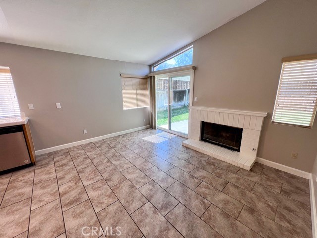 39879 Osprey Road Murrieta, CA 92562 - Photo 13 of 38 a view of empty room with fireplace and fan