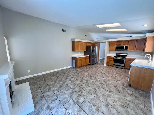 a room with furniture and a flat screen tv