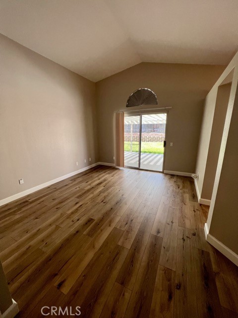 39879 Osprey Road Murrieta, CA 92562 - Photo 25 of 38 wooden floor in an empty room with a window