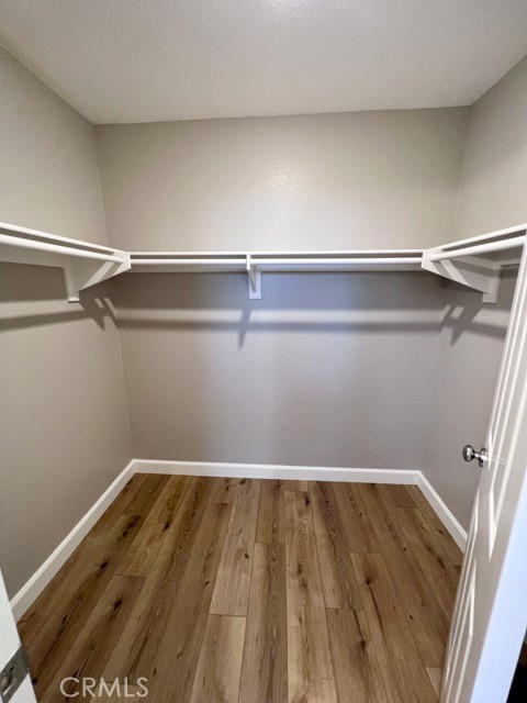 39879 Osprey Road Murrieta, CA 92562 - Photo 30 of 38 a view of a room with wooden floor