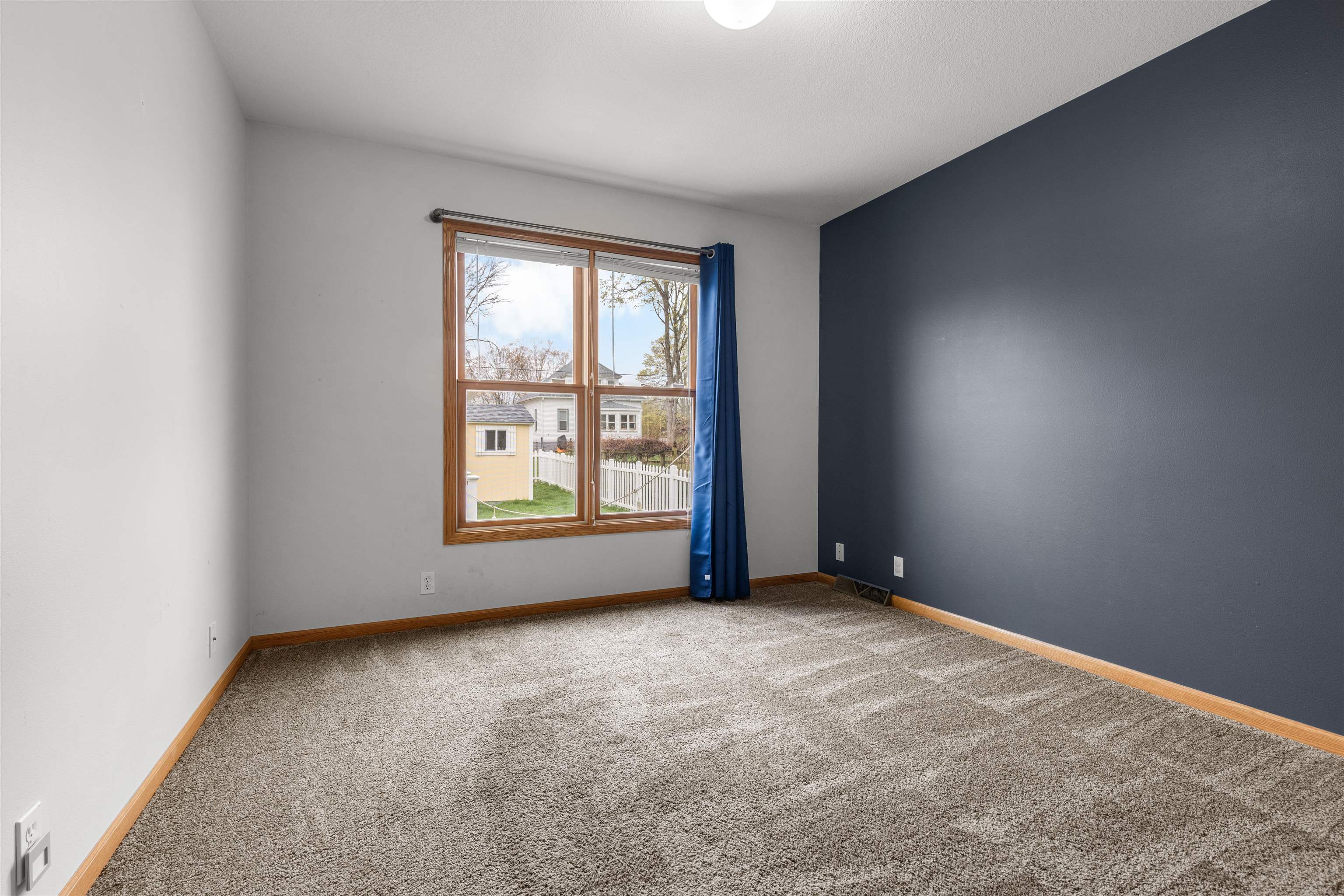 607 South 6th Street Oregon, IL 61061 - Photo 12 of 23 an empty room with windows