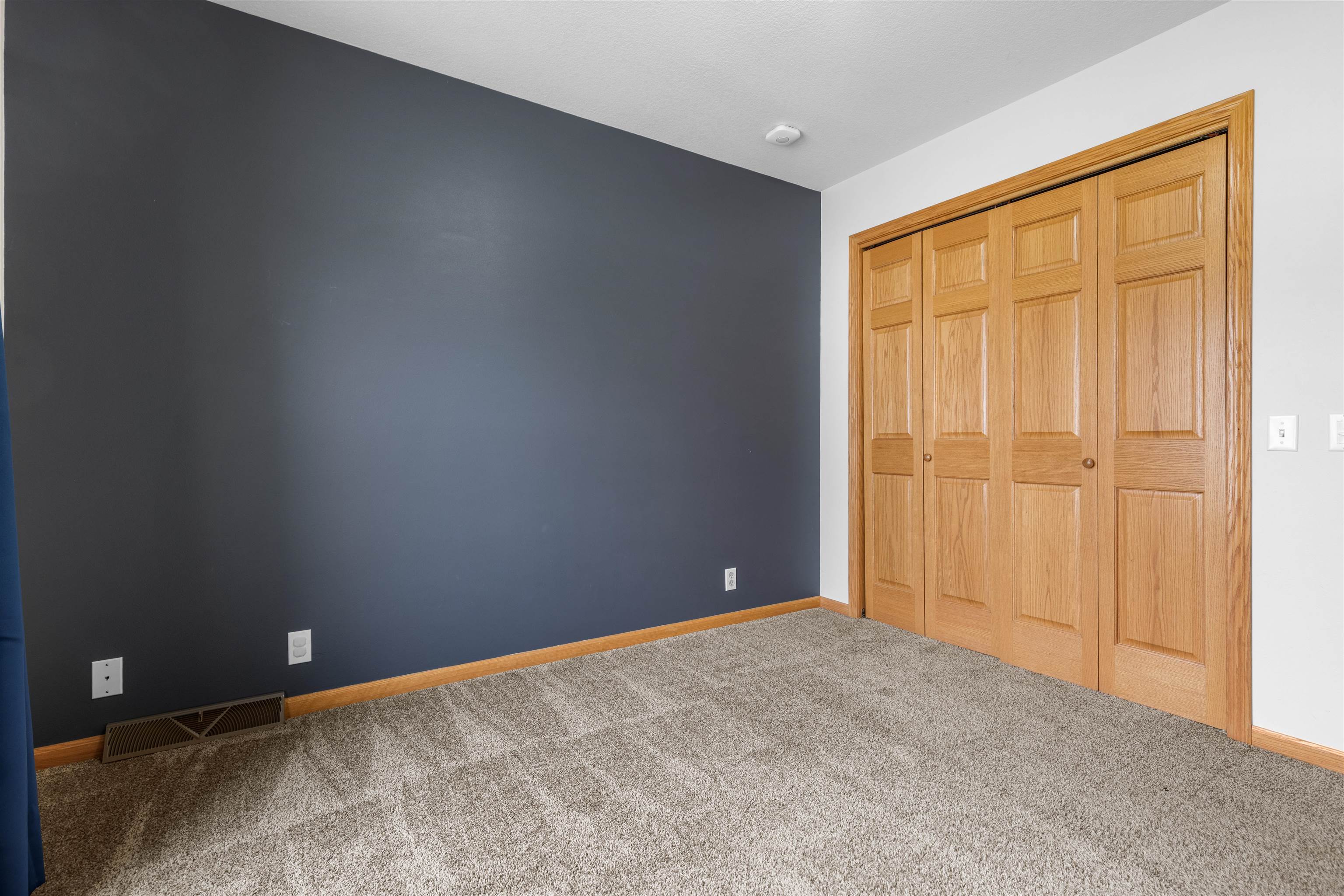 607 South 6th Street Oregon, IL 61061 - Photo 13 of 23 an empty room with sliding door