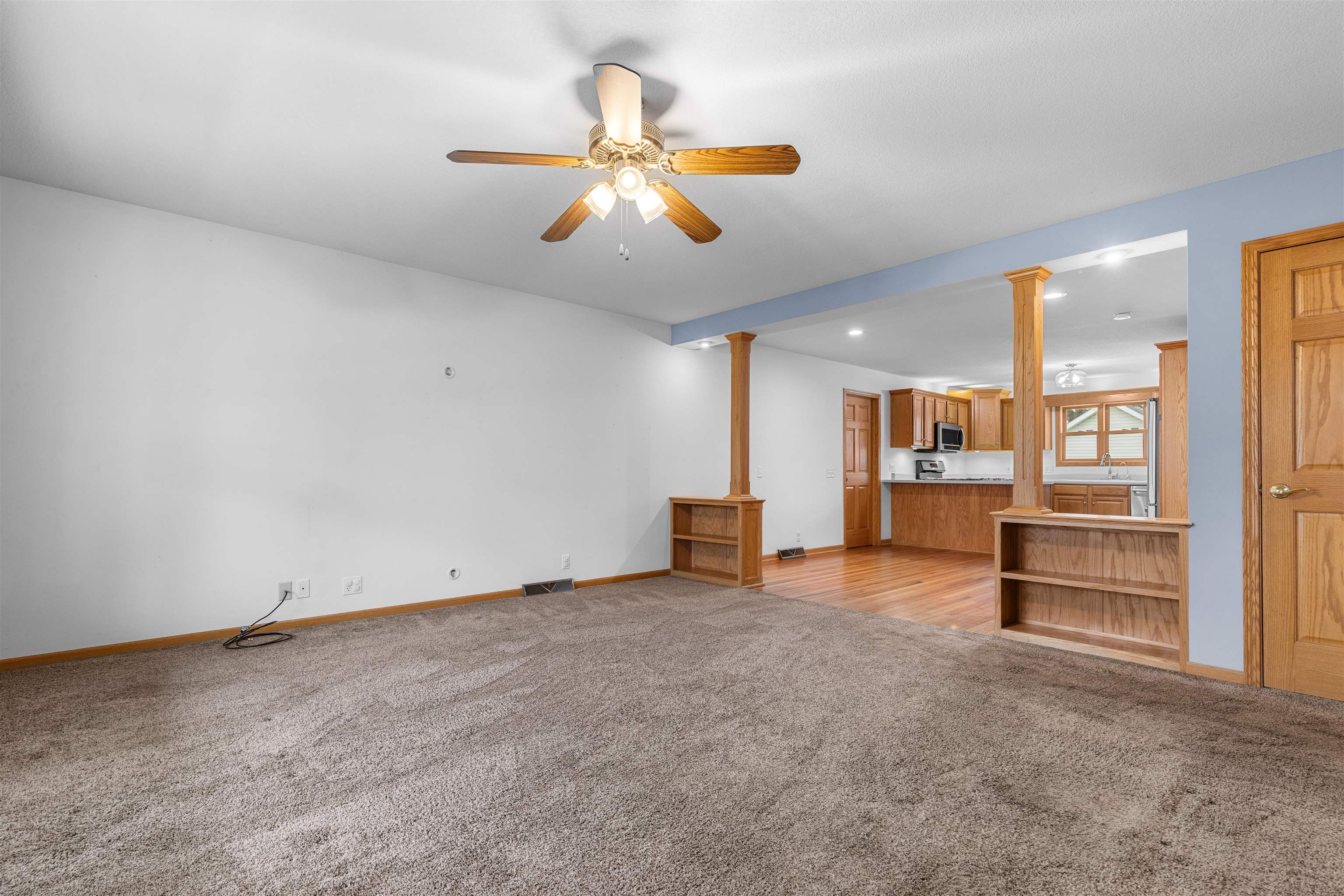 607 South 6th Street Oregon, IL 61061 - Photo 4 of 23 an empty room with closet and windows