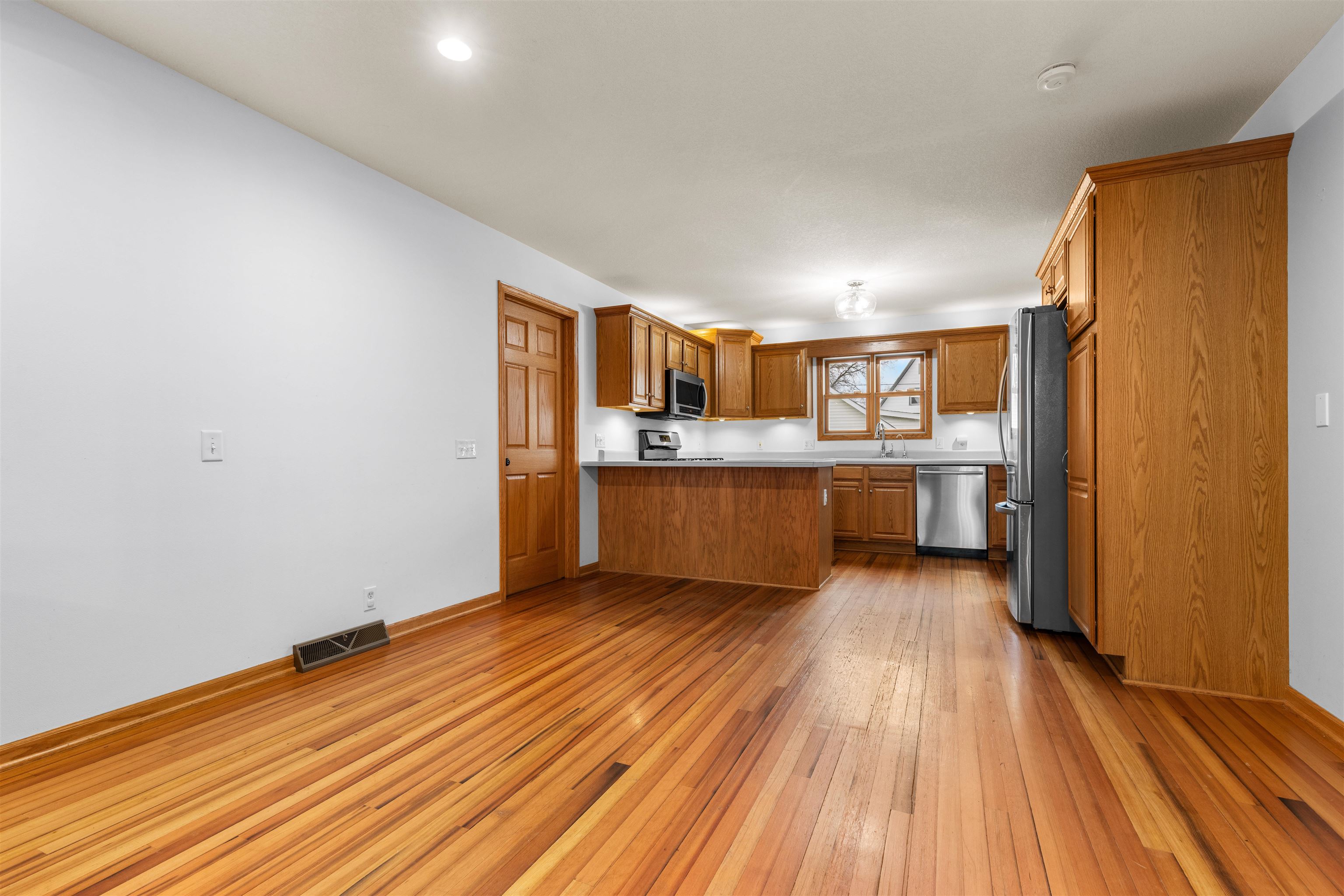 607 South 6th Street Oregon, IL 61061 - Photo 5 of 23 a view of kitchen with wooden floor