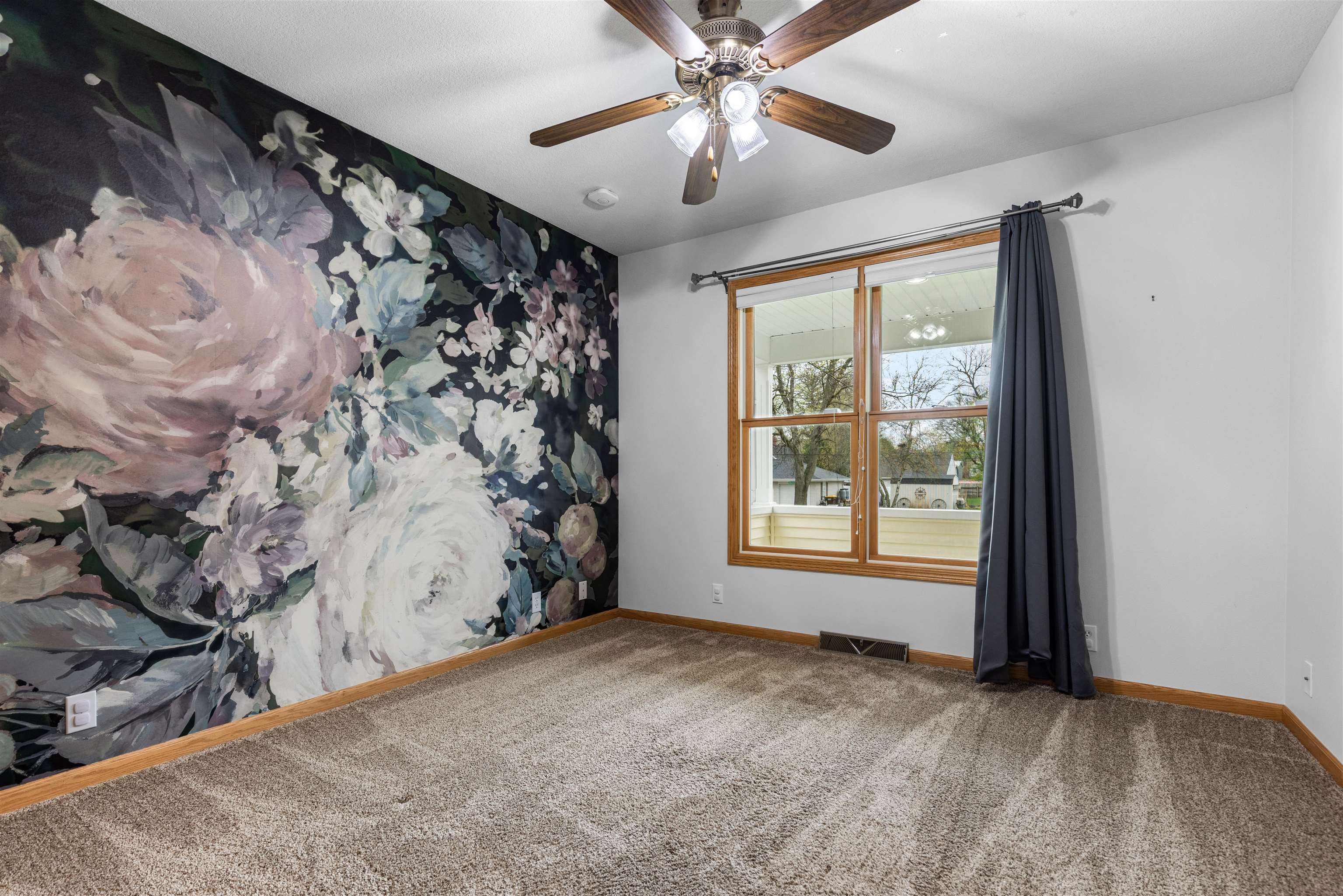 607 South 6th Street Oregon, IL 61061 - Photo 9 of 23 a view of an empty room with a window