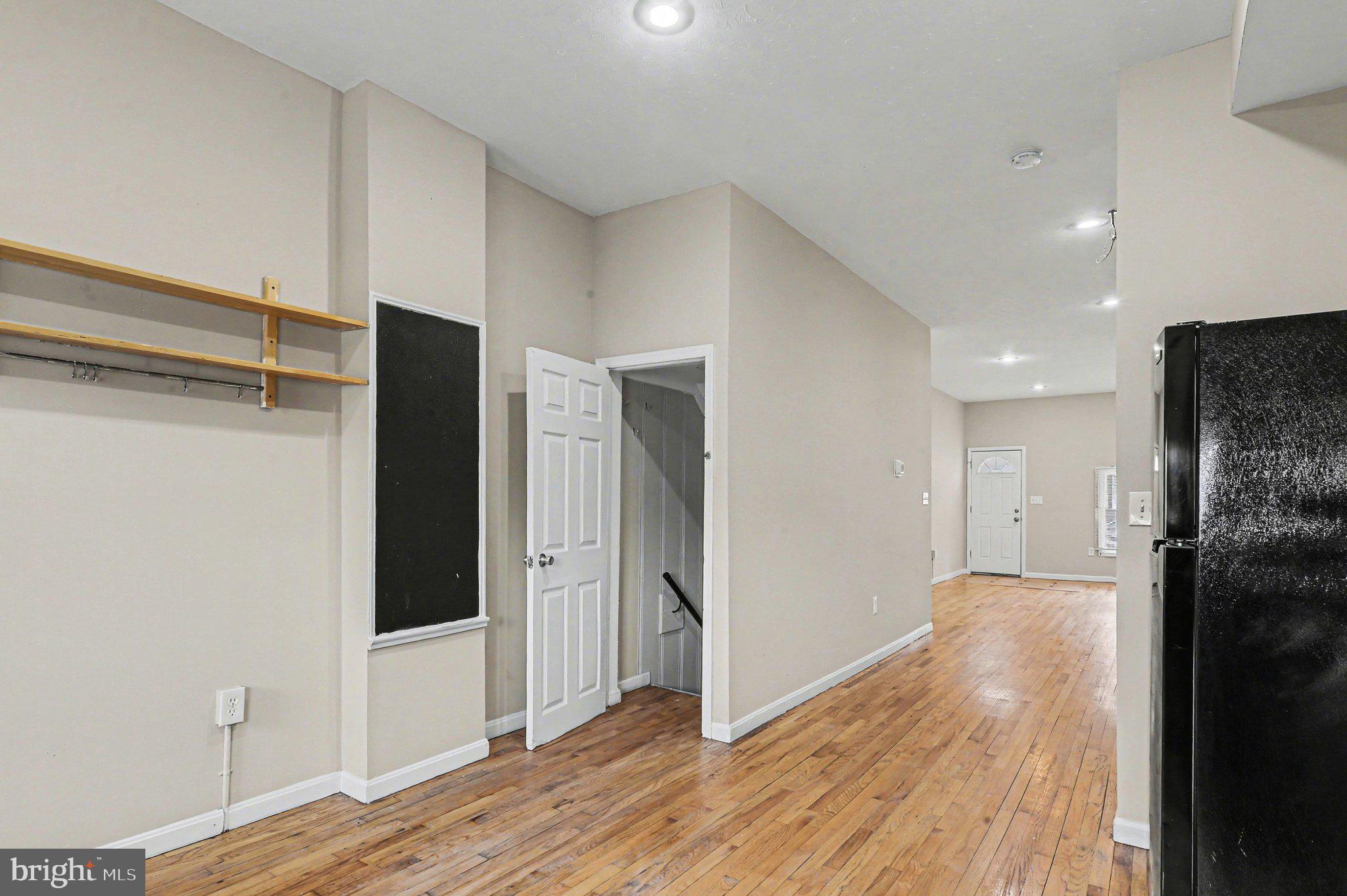 3418 East Baltimore Street Baltimore, MD 21224 - Photo 16 of 40 a view of hallway with wooden floor