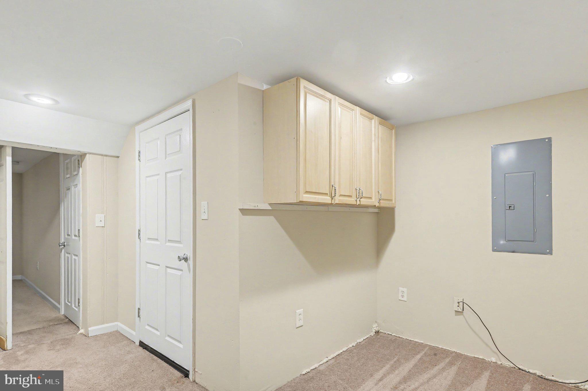 3418 East Baltimore Street Baltimore, MD 21224 - Photo 35 of 40 a view of an empty room with closet and a window