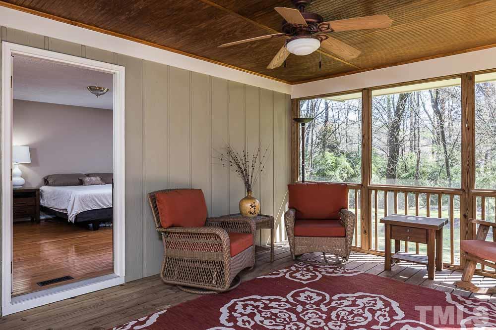 4904 Fallbrook Circle Raleigh, NC 27604 - Photo 14 of 30 Private screen porch off the primary bedroom.