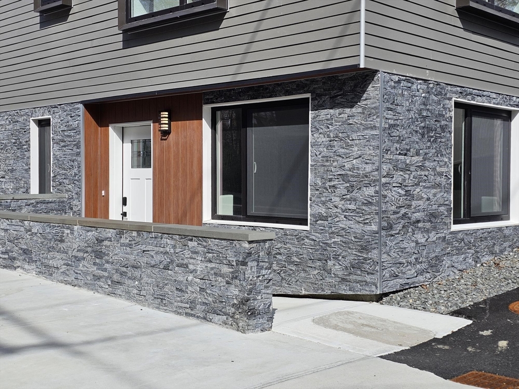 64 Alpine Street, Unit 104 Boston, MA 02119 - Photo 13 of 15 a view of front door of house