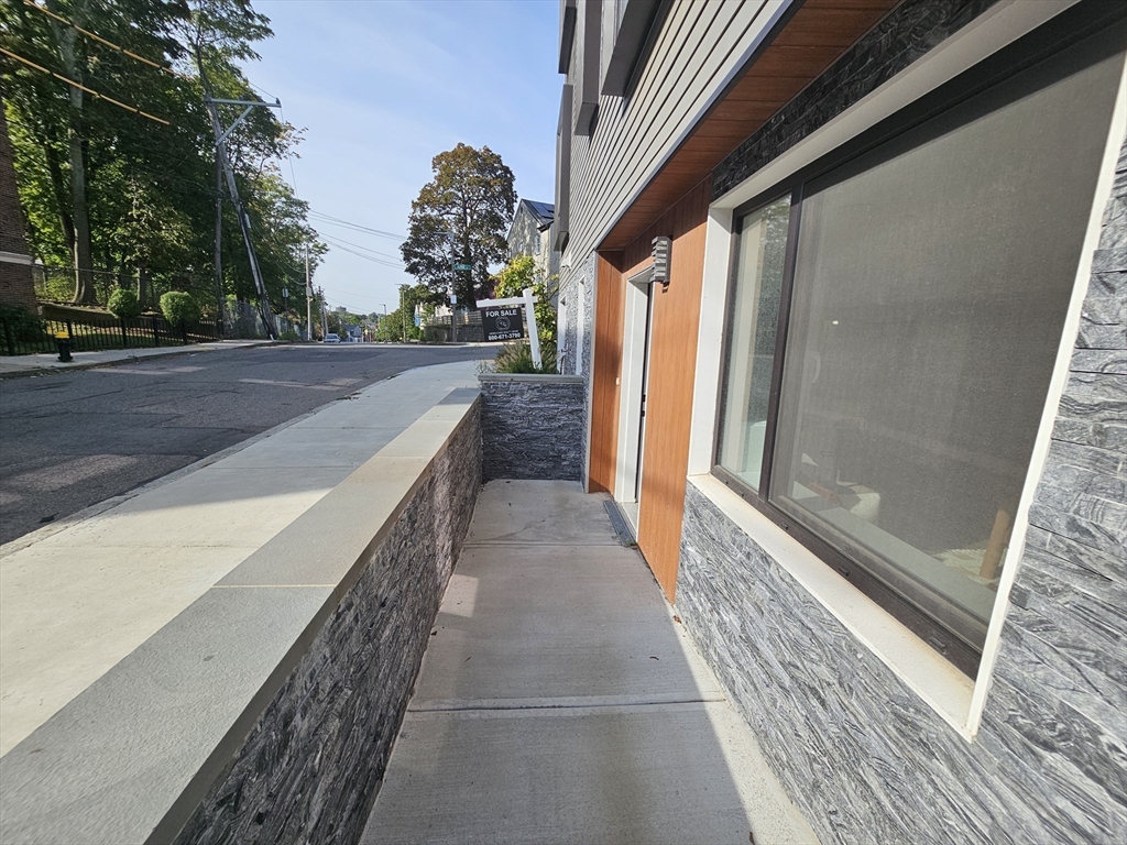 64 Alpine Street, Unit 104 Boston, MA 02119 - Photo 15 of 15 a view of balcony