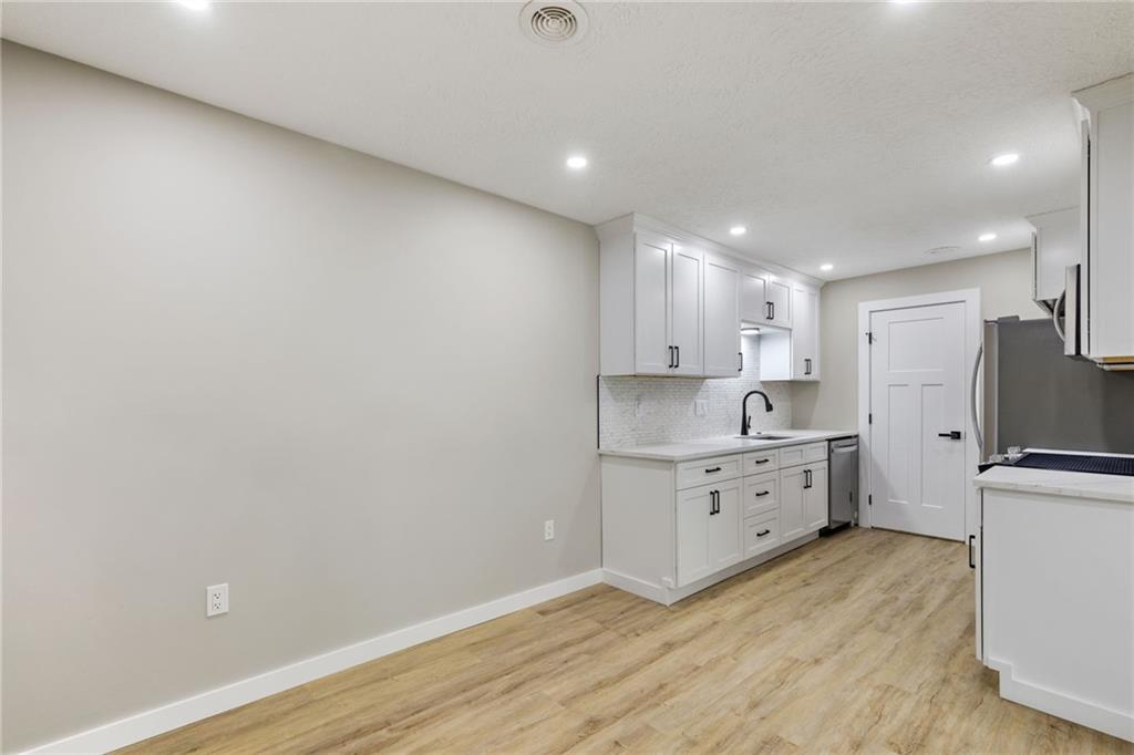300 Gilkeson Road, Unit 10B Pittsburgh, PA 15228 - Photo 17 of 31 a view of kitchen with wooden floor