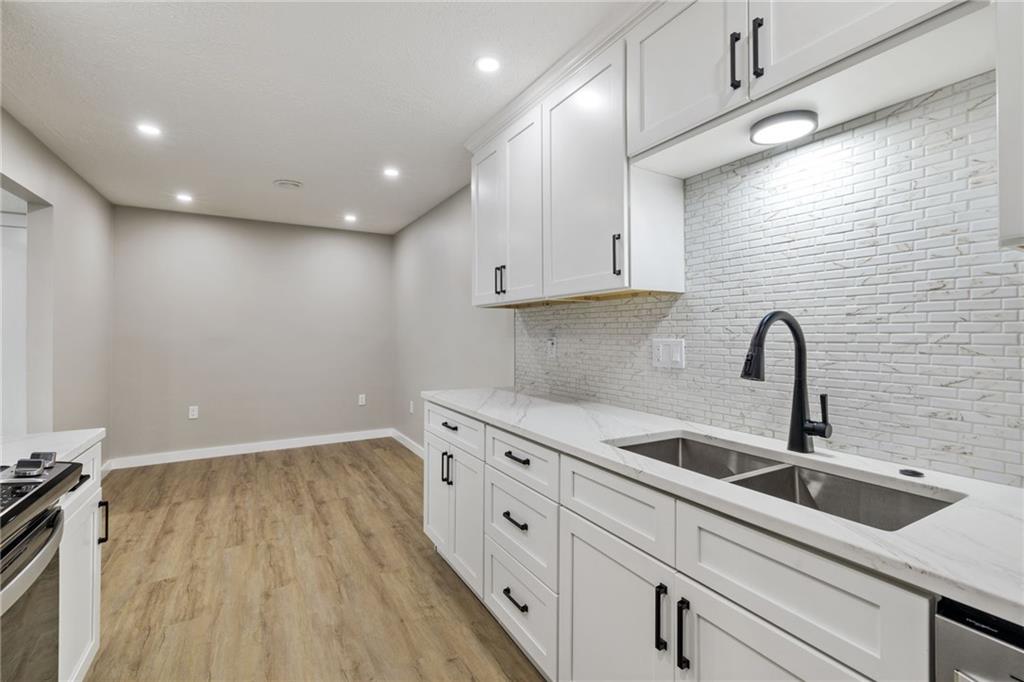 300 Gilkeson Road, Unit 10B Pittsburgh, PA 15228 - Photo 18 of 31 a view of a kitchen with a sink and cabinets