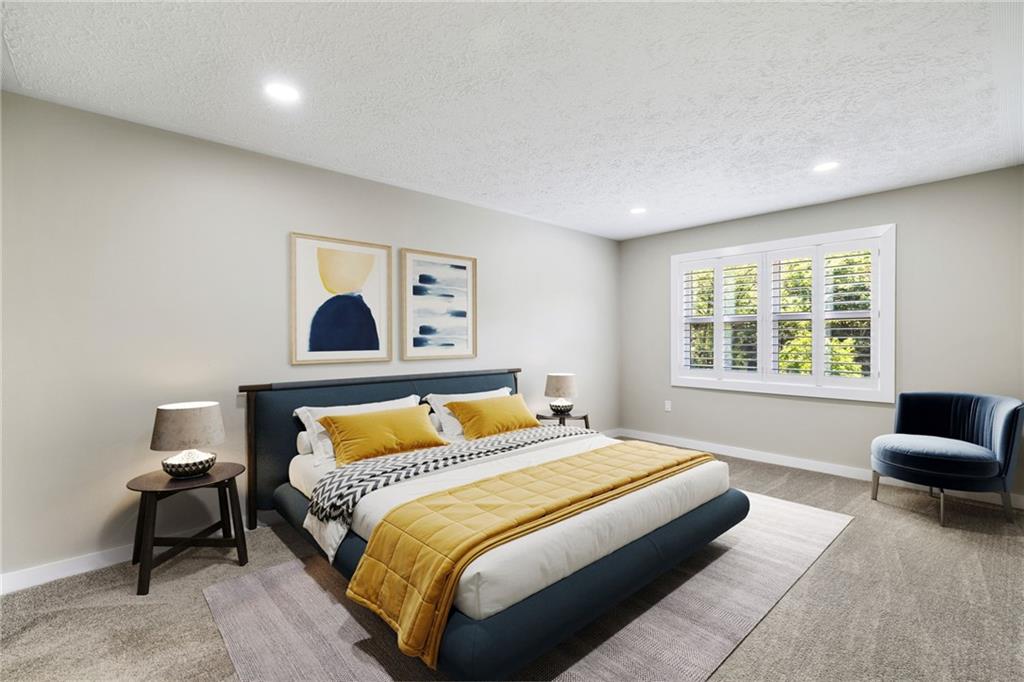 300 Gilkeson Road, Unit 10B Pittsburgh, PA 15228 - Photo 20 of 31 a bedroom with a bed and couch