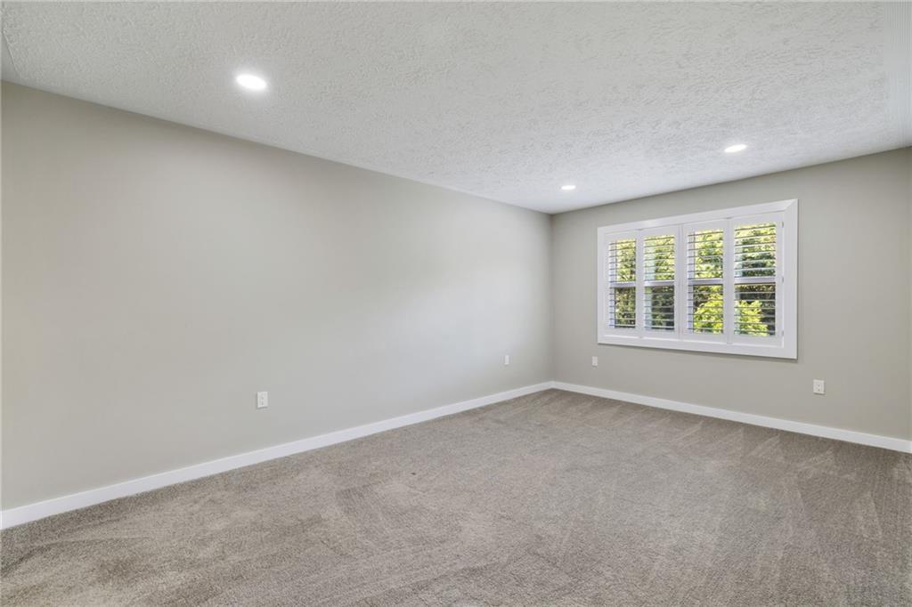 300 Gilkeson Road, Unit 10B Pittsburgh, PA 15228 - Photo 21 of 31 an empty room with windows