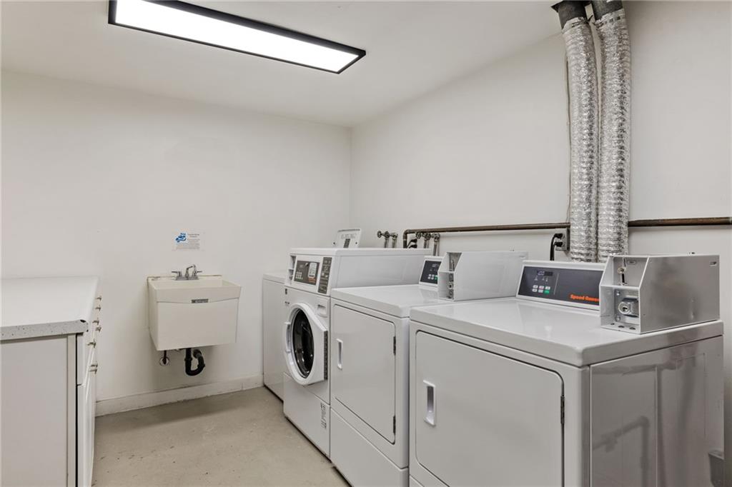 300 Gilkeson Road, Unit 10B Pittsburgh, PA 15228 - Photo 29 of 31 a utility room with dryer and washer